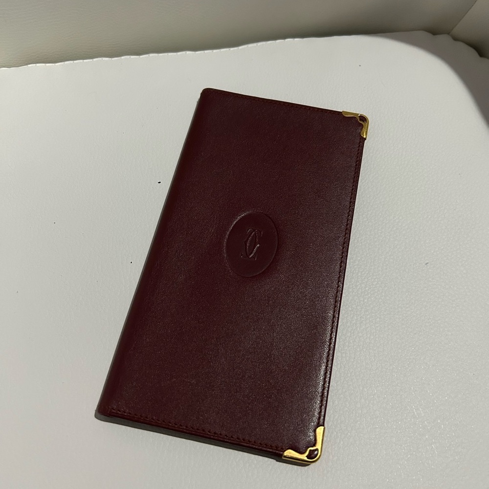 Cartier Burgundy Leather Wallet with Gold Accents